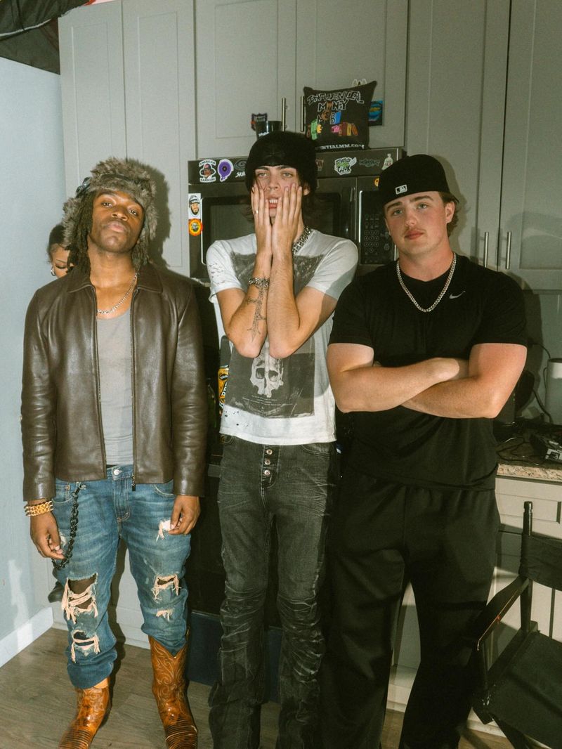 MAYO with collaborators in a studio