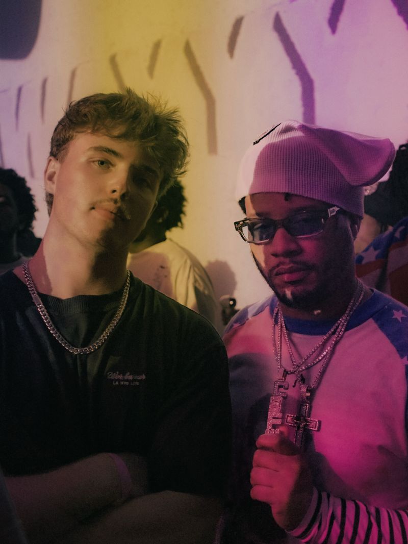 MAYO with a collaborator under pink lights