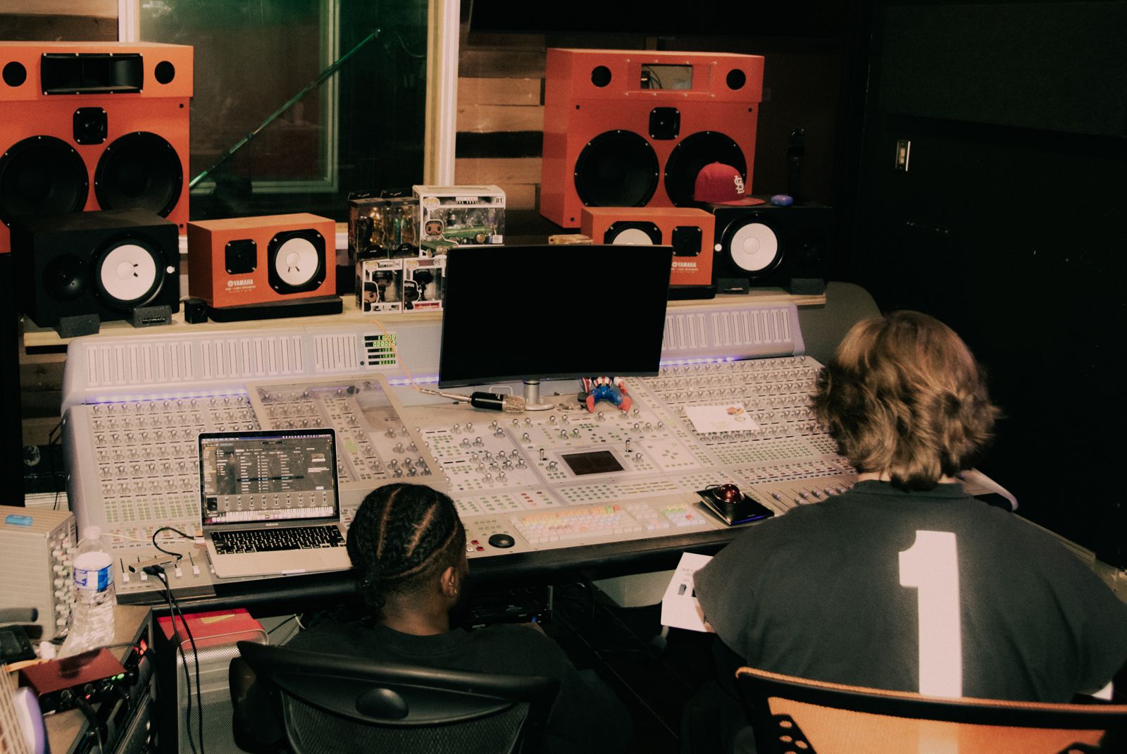 MAYO at the mixing console in a recording studio